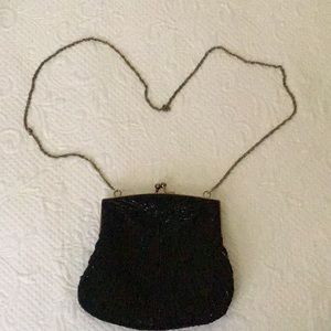 Precious black beaded clutch with chain
